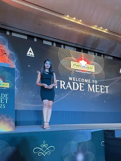 Commanding the stage at the Mangaldeep Trade Meet.
