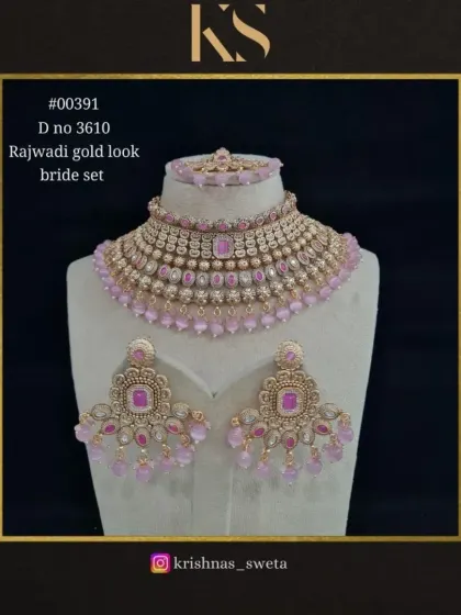 This Rajwadi bridal set is also available in a soft pink, offering a romantic and modern look.