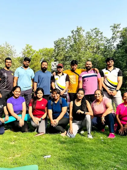 "A healthy outside starts from the inside." A group photo from one of our invigorating park yoga sessions.