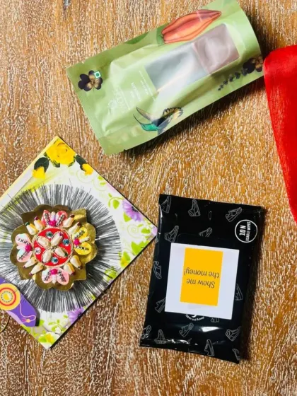 A close-up of the unique rakhi and other small gifts that go into the festive bags.