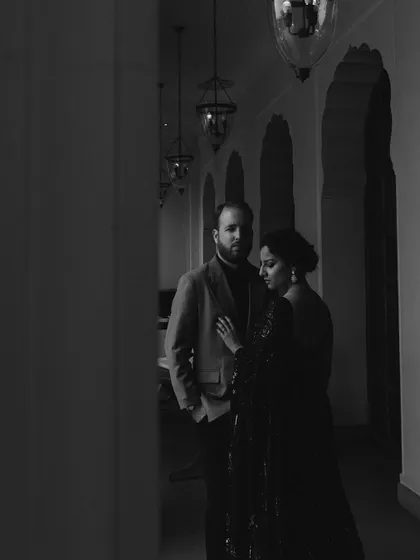A moody and atmospheric black and white portrait of Priyanka and Luke at the Oberoi Rajvilas. This post-wedding shoot has a very editorial and high-fashion feel.