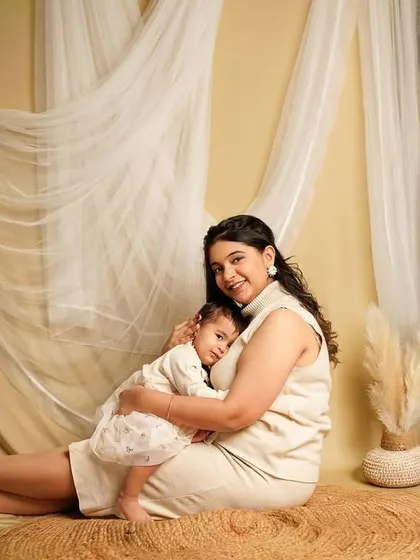 A warm embrace between mother and child. These are the cuddles and quiet moments that define the early years of motherhood, preserved forever.