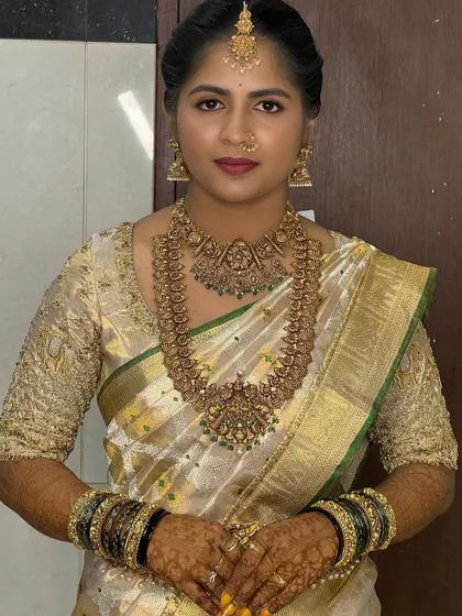 Here, the makeup is soft and natural, letting the magnificent temple jewelry and the bride's own beauty shine. I teach the importance of balance, knowing when to be bold and when to be subtle.