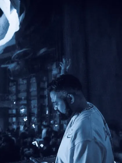 A moody, blue-toned shot of me at the decks, creating a sense of deep, atmospheric techno.
