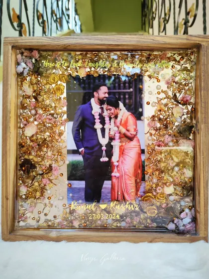 The full view of the elegant 12x12 inch teakwood frame, a timeless keepsake of a couple's love story.