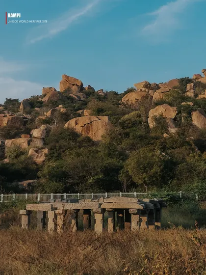 A series of images presented as pages from a travel magazine, each with a text overlay explaining Hampi's history. These photos capture various ruins, including temple tanks, stone pillars, and mandapas, telling the story of the lost empire.