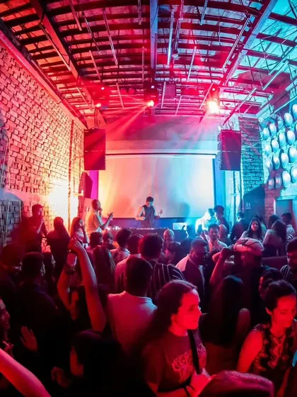 The red and blue lighting at Roxy, Kolkata, creates a cool, moody atmosphere. Here is a shot of the crowd vibing early in the night.