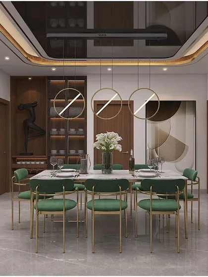 A dining room concept that radiates elegance, with emerald green chairs, a marble table, and striking circular pendant lights.
