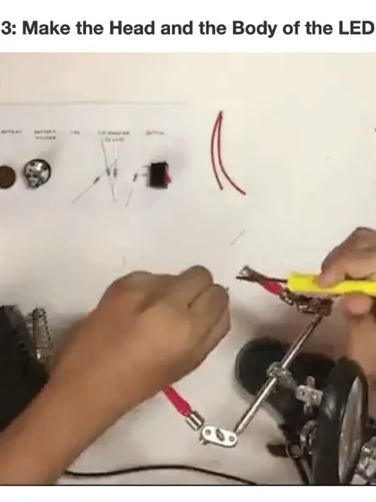 Step 3: making the head and body of the LED man. This involves carefully soldering the resistors to form the limbs and connecting them to the LED.