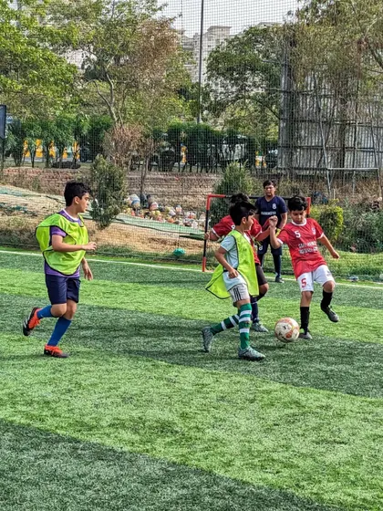 Teamwork in defense as our players work to close down an attack near the goal.