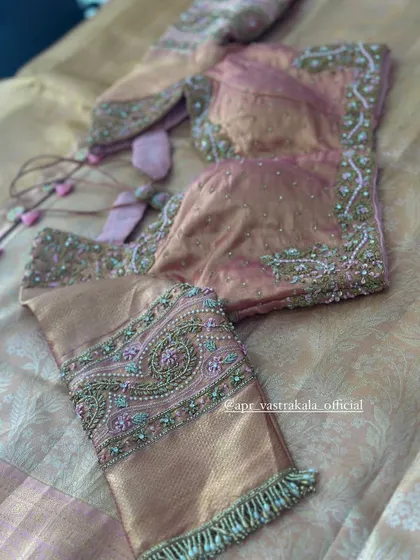 Another view of the dusty pink paisley blouse.