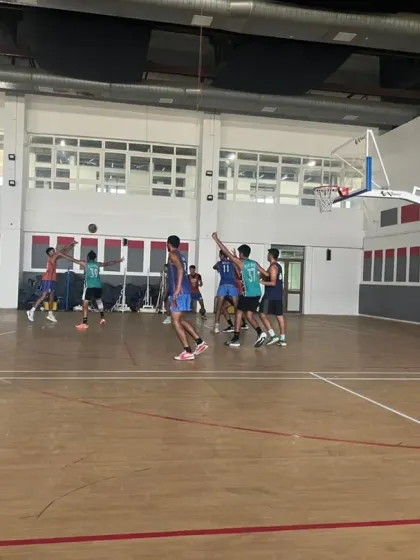 Action from an indoor practice match. Players are seen running a fast break, a key part of our offensive strategy.