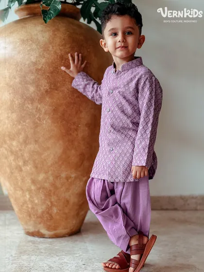 A full-length view of our client in the lavender Patiala set. The comfortable fit and stylish color make it a fantastic choice for any festive event.