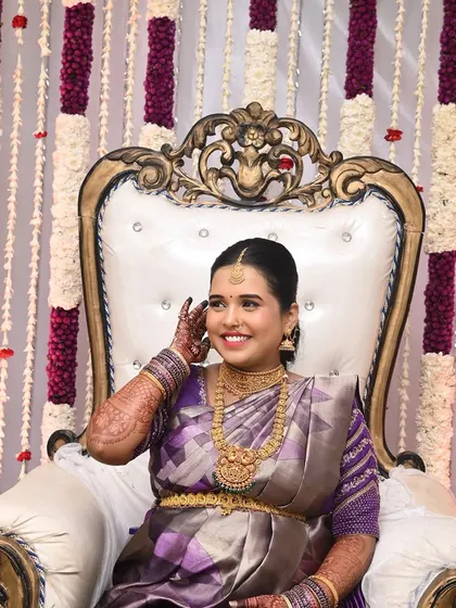 A happy, candid moment from Sahana's baby shower. Her makeup is designed to look flawless and feel comfortable throughout the event.