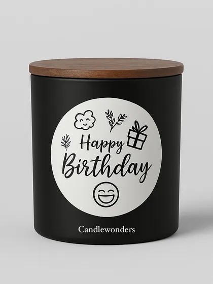A sleek matte black jar candle with a custom "Happy Birthday" label. A modern and stylish birthday gift.