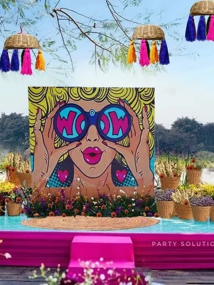 Your wedding should reflect your fun side! I designed this quirky and vibrant Mehendi stage with a pop-art backdrop and colorful hanging baskets to create a lively, high-energy photo zone that was an absolute hit with the guests.
