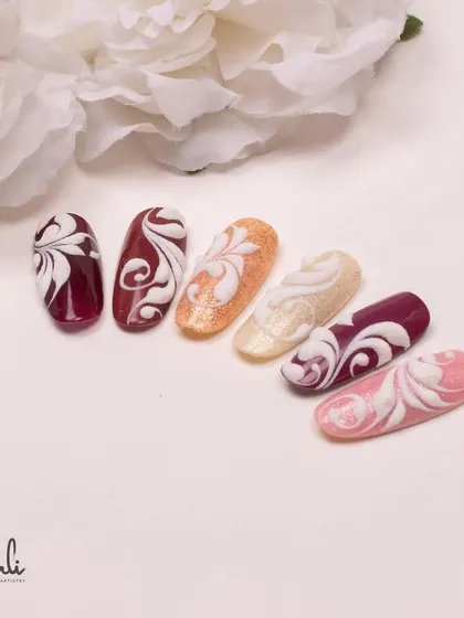 Another shot of the embossed swirl designs, highlighting the rich colors and intricate, raised patterns.
