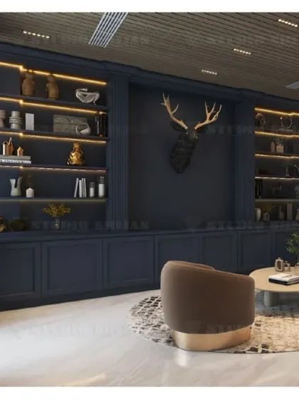 Another angle of the library wall in the Mansarovar Garden lobby, highlighting the warm, integrated shelf lighting.