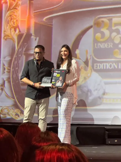 Another photo from the awards stage, capturing the happiness and pride of this achievement.