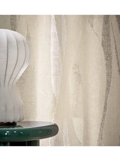 'Chaloupe' is a cut yarn jacquard voile that is beautifully translucent. As a double-width fabric, it is perfect for creating seamless, elegant sheers for large windows, available in a range of natural shades.