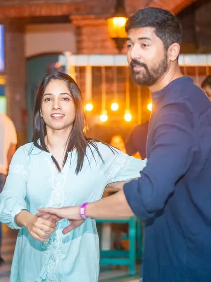 A focused and connected moment. You can see the communication happening between the two partners.