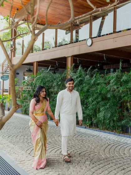 A couple taking a stroll at their wedding venue. These relaxed portraits are a great way to capture the beauty of the location.