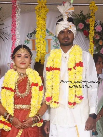 Another shot from the wedding ceremony, capturing the couple in their traditional attire.