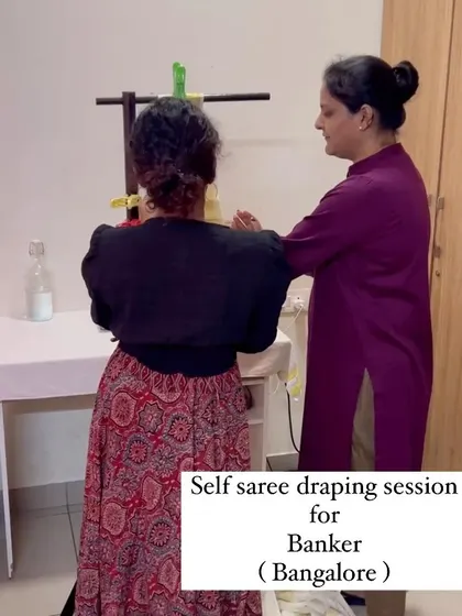 An in-person session with a banker from Bangalore. We are practicing the pleating technique, which is the foundation of a good saree drape.