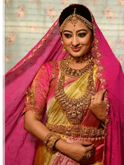 Adding a sheer veil can create a soft and dreamy effect. The beautiful jewellery still shines through, making the bride look absolutely ethereal.