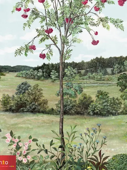A detailed view of the 'Rowan' wallpaper by Nobilis. The artwork captures the beauty of a countryside vista, with a central rowan tree and lush greenery, bringing a sense of calm and natural elegance to the wall.