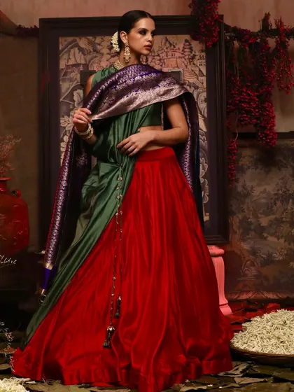 A full-length shot showcasing a beautiful color-blocked lehenga and dupatta from Soho Begum's collection.