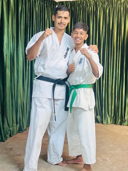 With one of my dedicated green belt students during our Ooty training camp. It is a privilege to guide them on their journey.