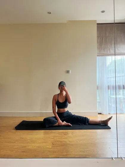 A post-stretch selfie. Flexibility and conditioning are a crucial, though often unseen, part of a dancer's routine.