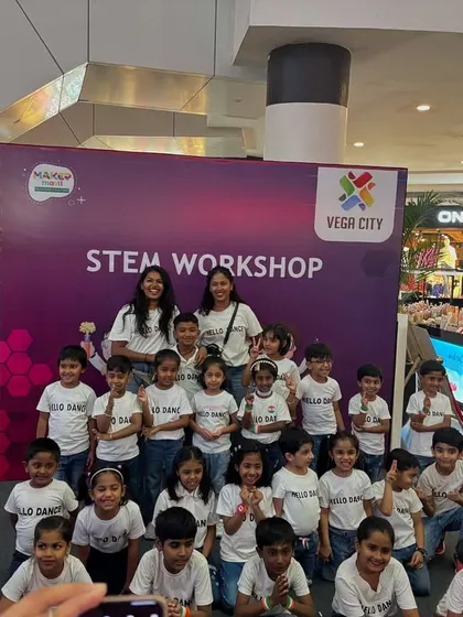 The whole crew posing after a successful flashmob at the Vega City mall. We love seeing the proud and happy faces of our performers, both kids and adults.