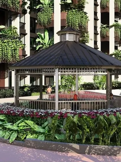 A classic white gazebo at 'Villa On Sky', surrounded by a ring of colorful flowers, offers a picturesque and charming spot for relaxation.