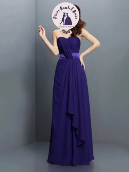 A simple one shoulder gown in a deep blue, perfect for an elegant evening look.