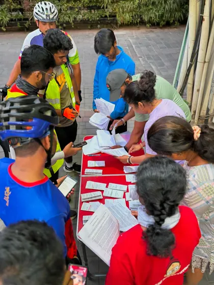 The registration desk is a hub of activity before the start of the 100K BP.