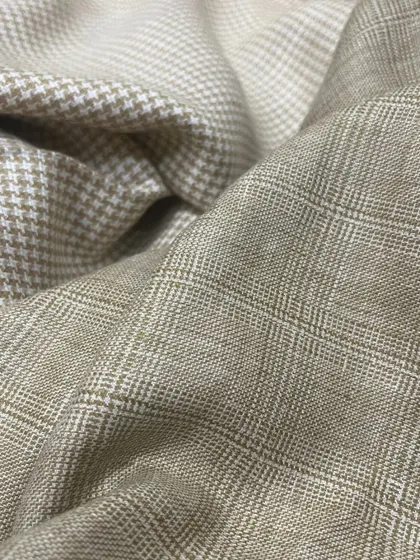 We present the ultimate comfort in light, airy fabrics, tailored to your perfect fit. Explore our range of checks and houndstooth.