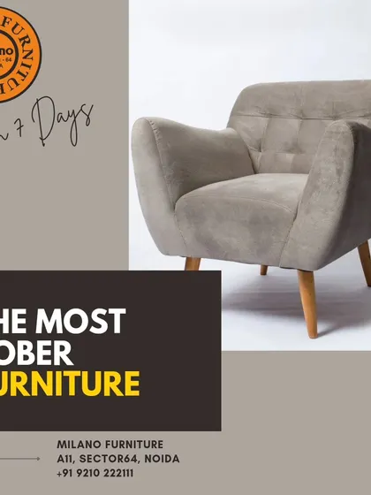 This sober and elegant armchair features a simple design with a tufted back and tapered wooden legs. It's a versatile piece that fits well in both modern and classic interiors.