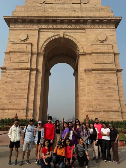 A group photo celebrating a couple's 16th anniversary at India Gate. We are honored to be a part of our guests' special moments and milestones.