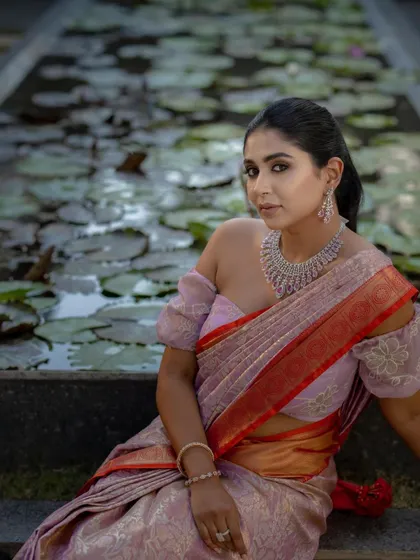 A modern bridal portrait by a serene water lily pond. This is a duplicate of ID 18, showcasing a beautiful blend of modern bridal style and traditional elegance.