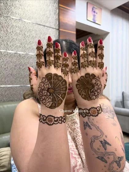 Another angle of the stylized peacock mehendi.