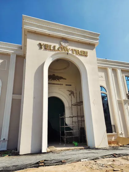 The grand entrance of Yellow Tree Banquets, where our landscaping work will soon frame the beautiful architecture.