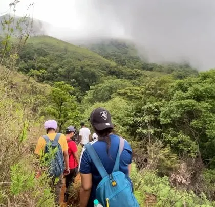 Following the path through the dense greenery of the Western Ghats. Our guides lead the way, ensuring a safe and enjoyable experience for everyone.