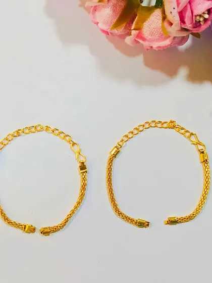 Here is another look at our popular gold-plated Rakhi chains. The simple, flat design is comfortable to wear and easy to decorate.