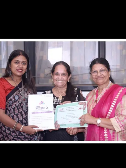 A wonderful moment with a student who has successfully completed the course. It's a joy to see women of all ages embrace this art form.