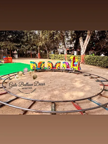 A mini train ride for kids, a great entertainment addition for an outdoor jungle or carnival party.