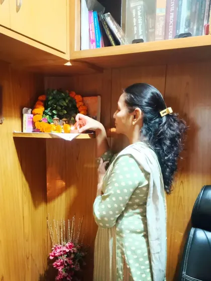 A moment of prayer and reflection during the festivities at our office.