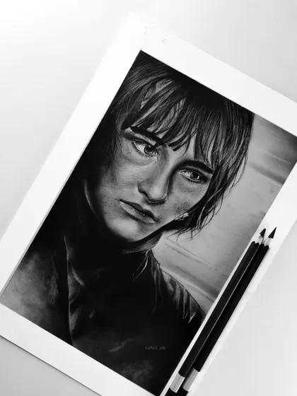 A charcoal portrait of Bran Stark from Game of Thrones. The dark, moody feel of charcoal was perfect for capturing the character's serious and mysterious nature.
