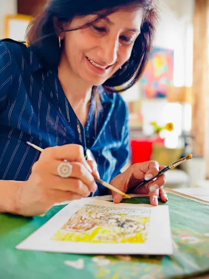 The smile of someone completely lost in the creative process. This lovely lady brought such grace and calm to the studio while painting this intricate piece.
